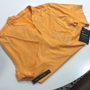 Nike women’s Dri-Fit floral pattern golf shirt